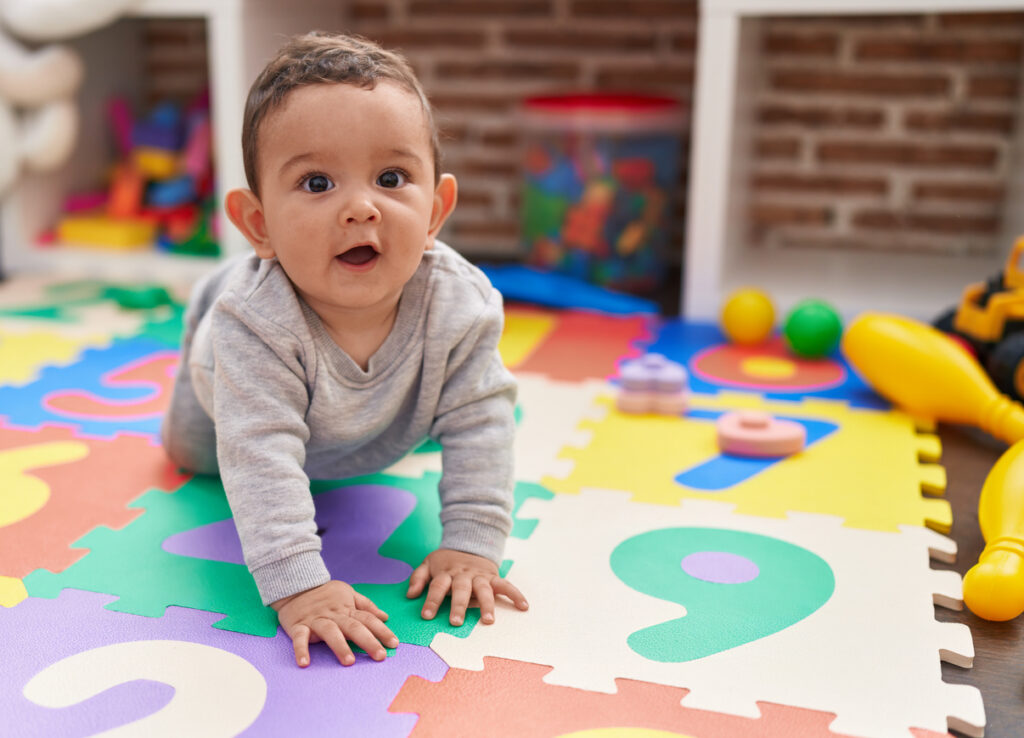 Baby crawling on floor